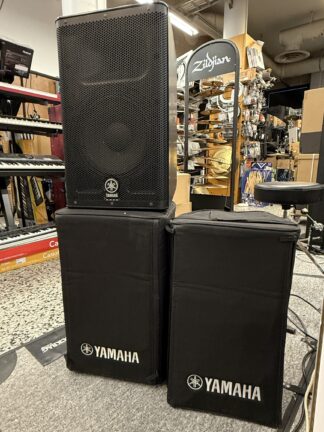 Käytetty Yamaha DXR10 aktiivikaiutinpari suojapusseilla
